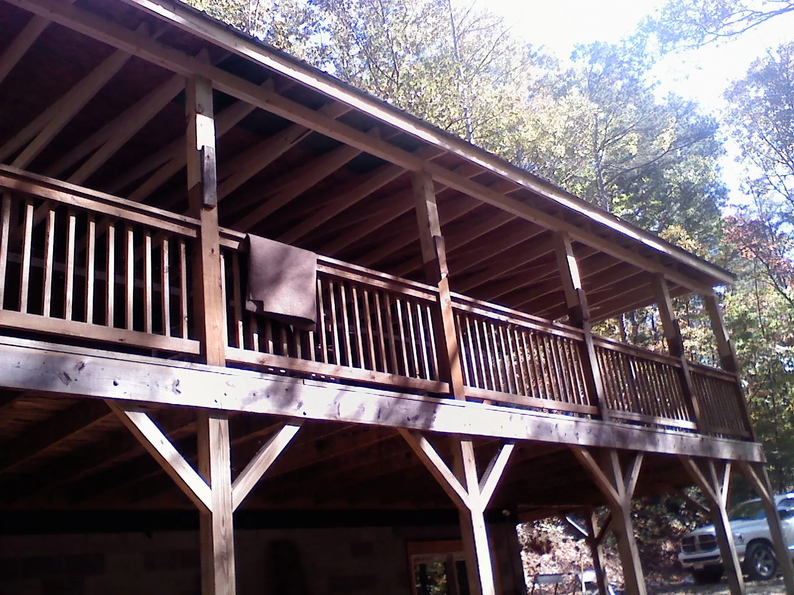 Timber framing under a new elevated porch and deck — Roof Leak Repair in Manlius by Roofing Brothers